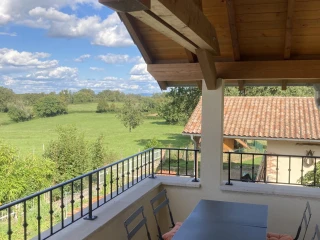 Balcony overlooking the countryside at the gîte Le Benouchon