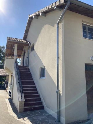 Stairs and separate entrance of the gîte Le Benouchon